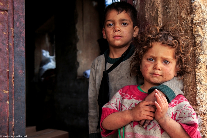 Mustafa*, 5, with his sister Fatima*, 3, were forced to leave their home in Syria because of violent clashes and heavy bombardment.