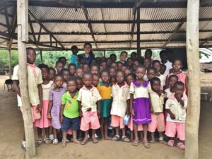 Emily Davis with kids in Ghana